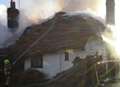 Thirty firefighters tackle cottage blaze