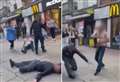 Three floored as shirtless man fights outside McDonald's 