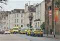 Large emergency response after man collapses in street