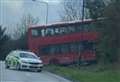 Police called after double-decker bus crashes into grass verge