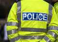 Police hunt after woman punched in face
