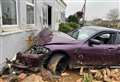 BMW ploughs into home with mother and baby inside