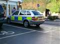 Police car caught in disabled bay