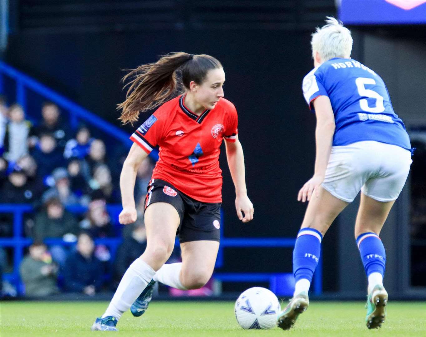 Lottie Sharp tries to get Chatham Town Women moving forward at Portman Road. Picture: Allen Hollands