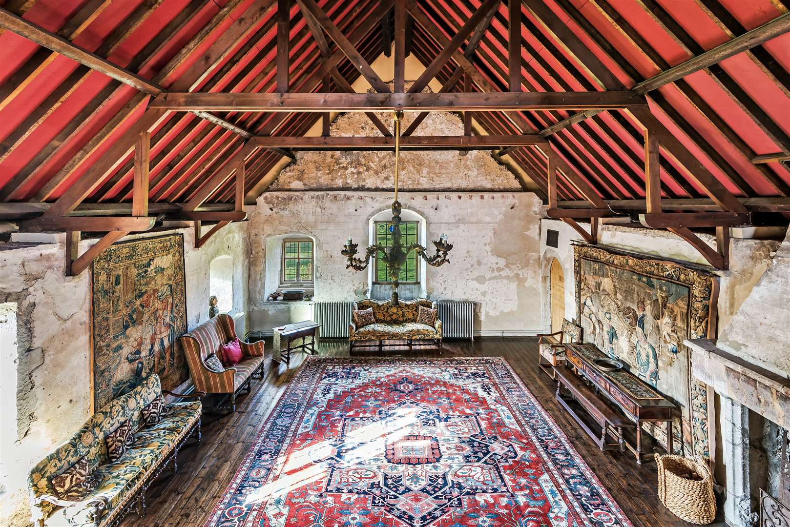 Unique murals are scratched into the plaster of the Great Hall and two of the bedrooms. Photo: Savills