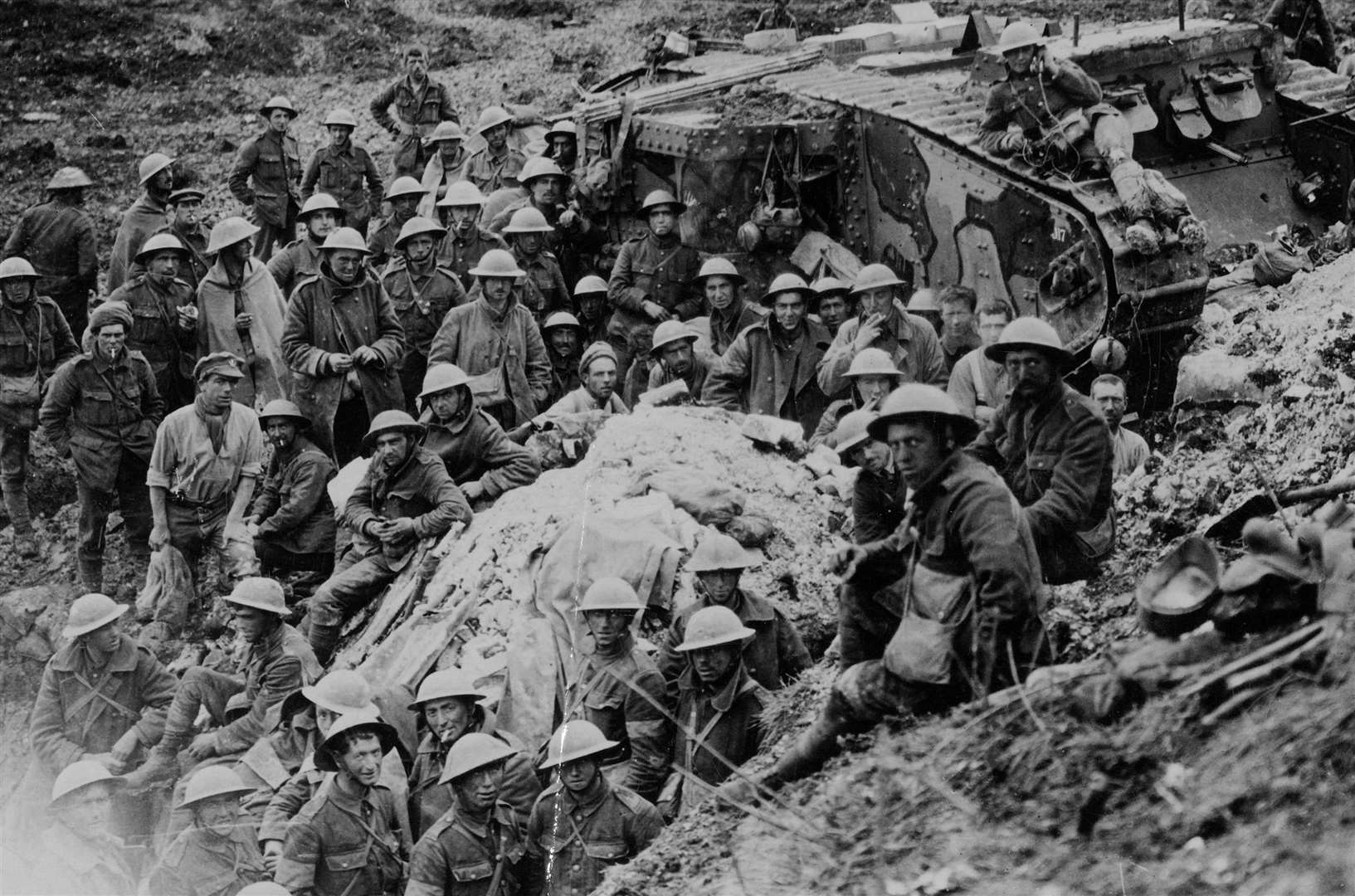 Undated handout file photo issued by the National Army Museum of soldiers with a tank at the Battle of the Somme. Picture credit: National Army Museum/Press Association Images