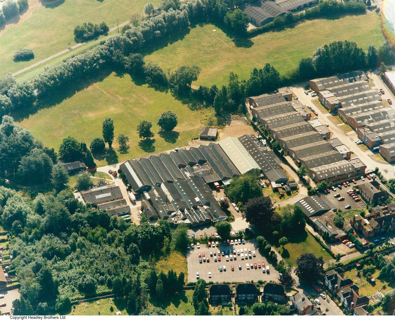Ashford's Headley Brothers site pictured in the 90s. Founded in 1881 by brothers Herbert and Burgess Headley to print paper bags, bill heads and circulars for Ashford businesses, the Lower Queens Road site was demolished in February 2019. Pic: Steve Salter