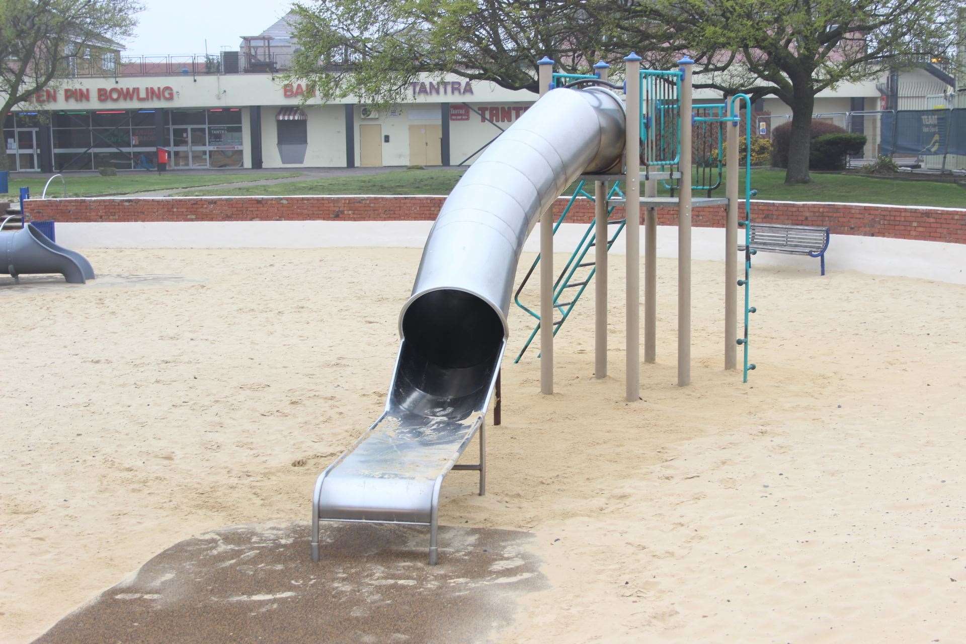 Metal slide at the sandpit children's play area at Beachfields on the seafront at Sheerness