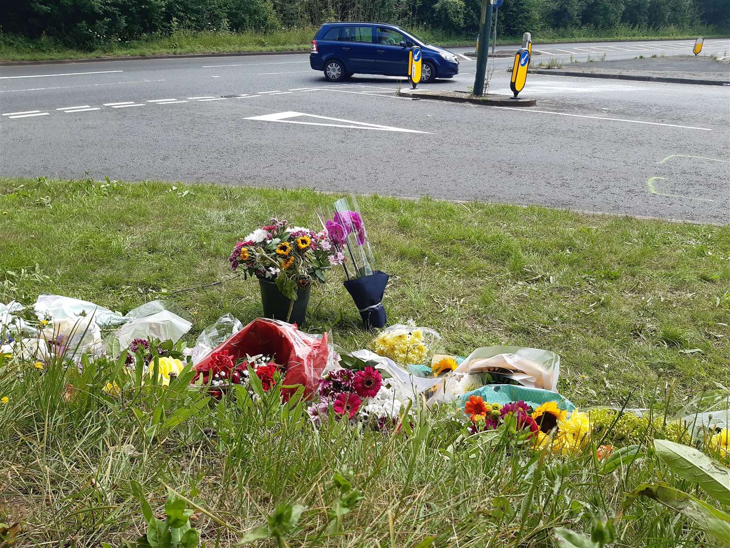Flowers left at the scene of an accident which claimed the life of a Gillingham biker Lawrence 'Loz' Dick