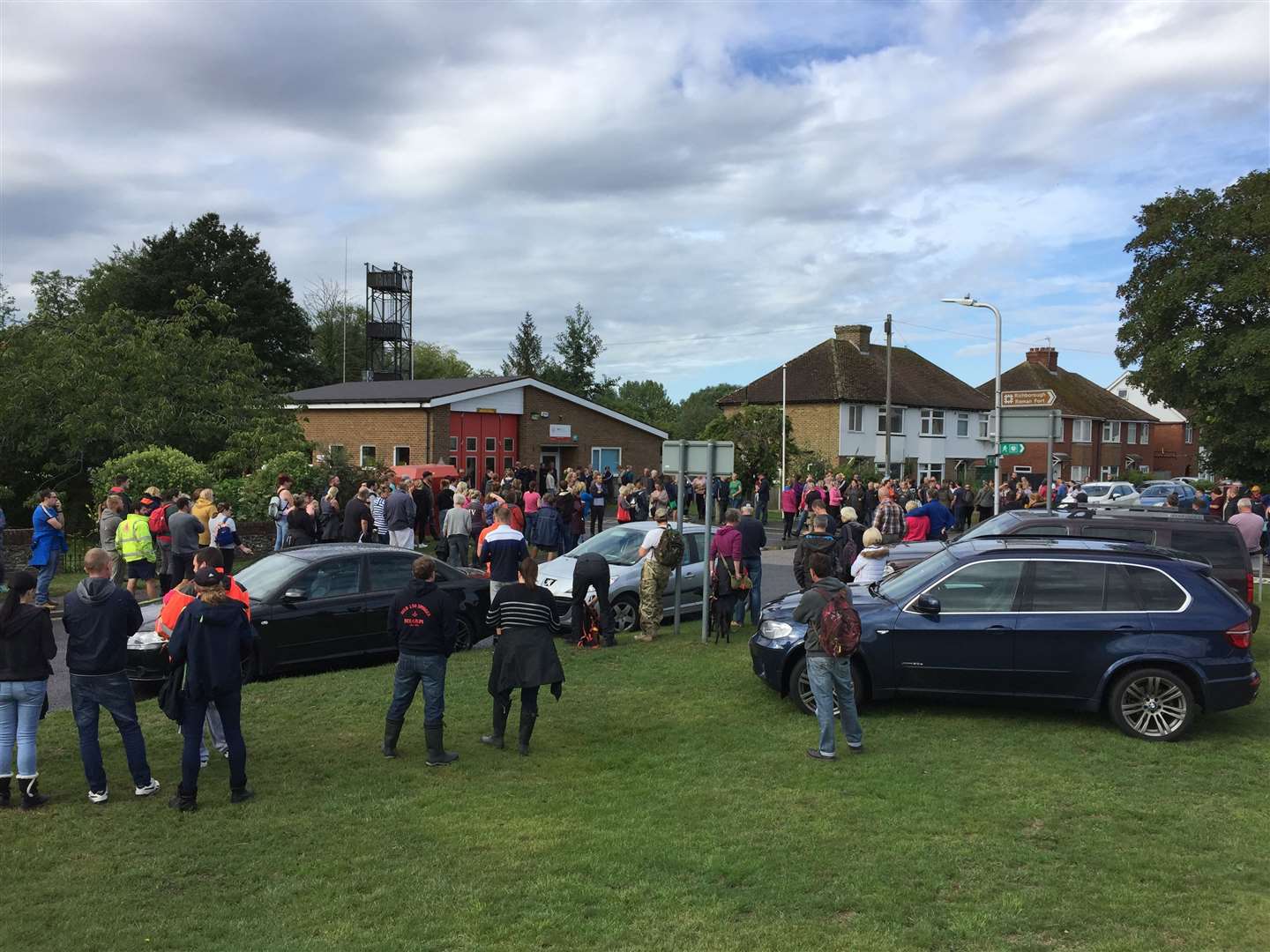 Crowds gather outside the fire station
