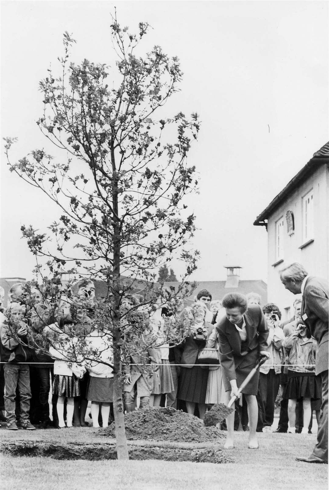 Princess Anne helps plant a tree at East Malling Research Station, 1988