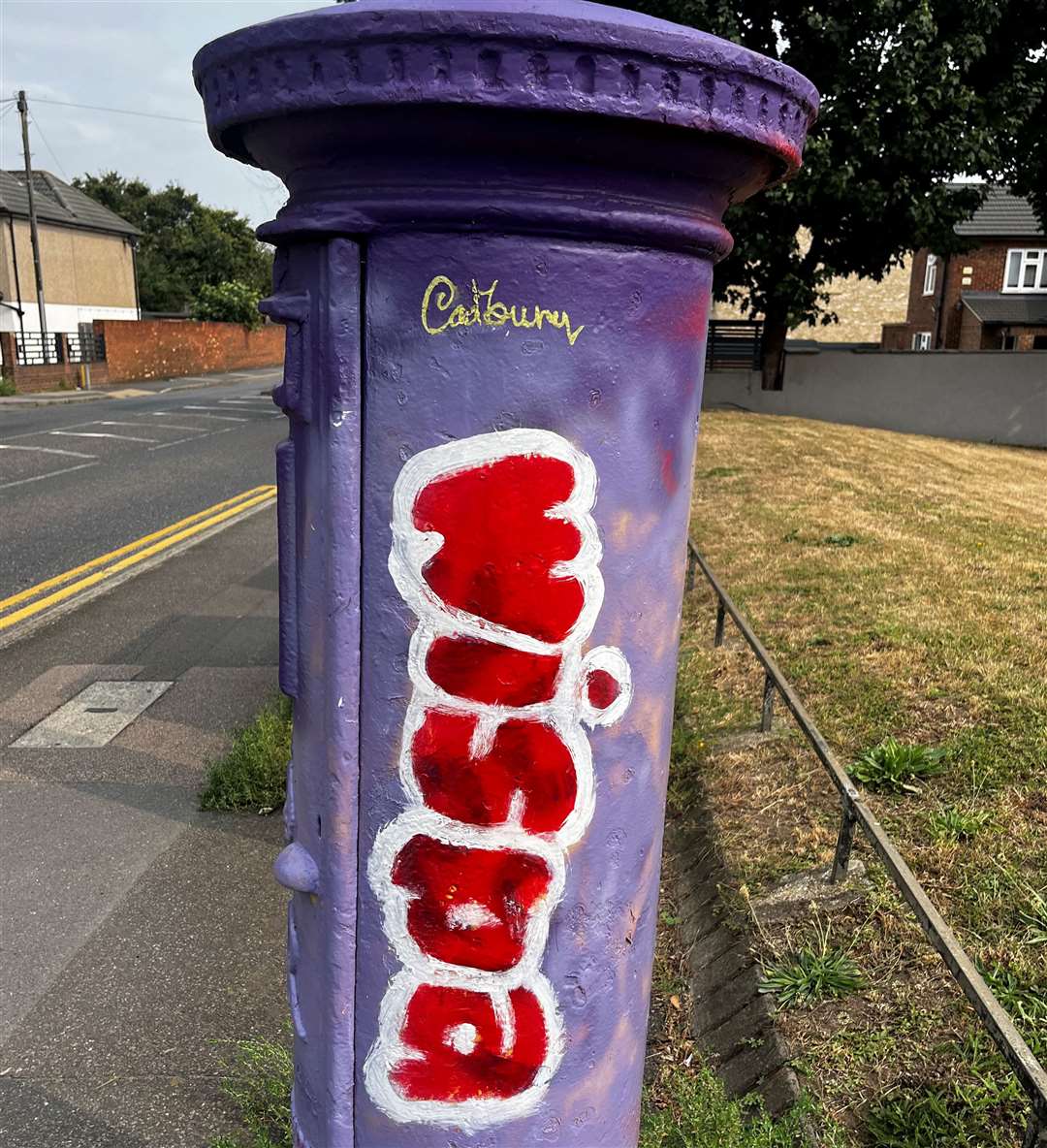 A postbox in Pilgrim's Way, Dartford has turned from a Cadbury's cream egg design to a Wispa