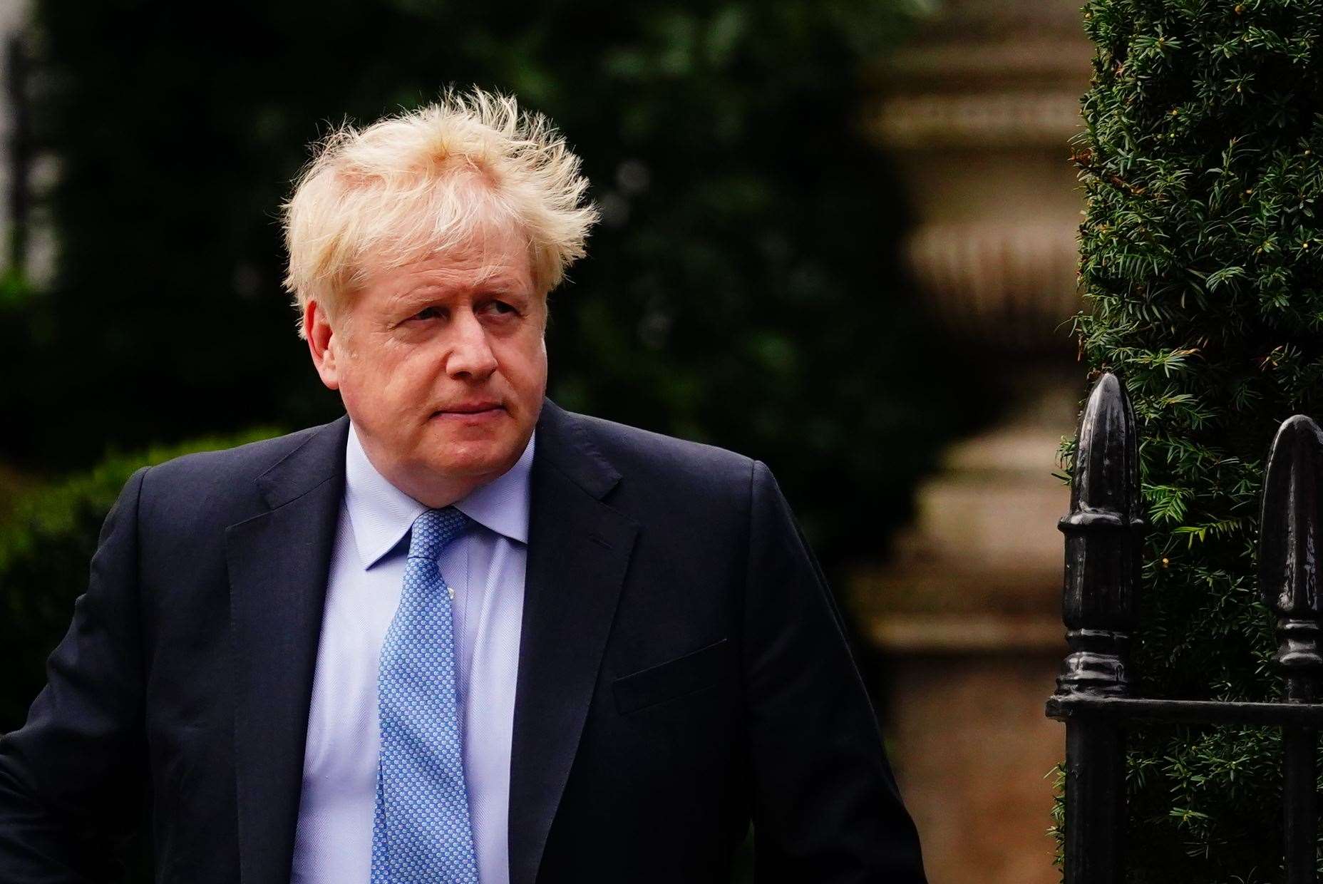 Former prime minister Boris Johnson leaves his home in London ahead of a grilling by the Privileges Committee (Victoria Jones/PA)