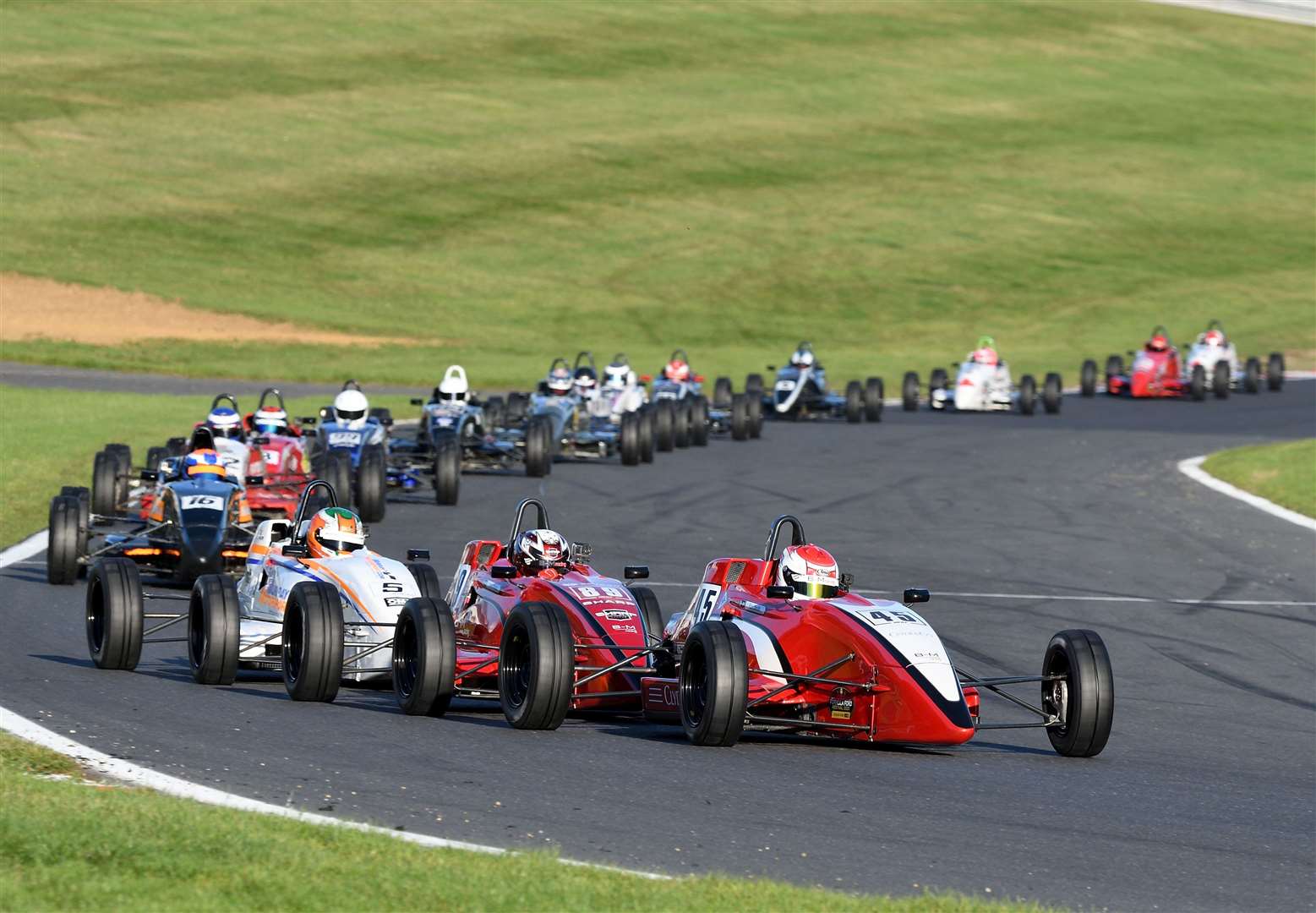 Smith leading Jamie Sharp and Niall Murray through Surtees in the 20-lap final. Picture: Simon Hildrew