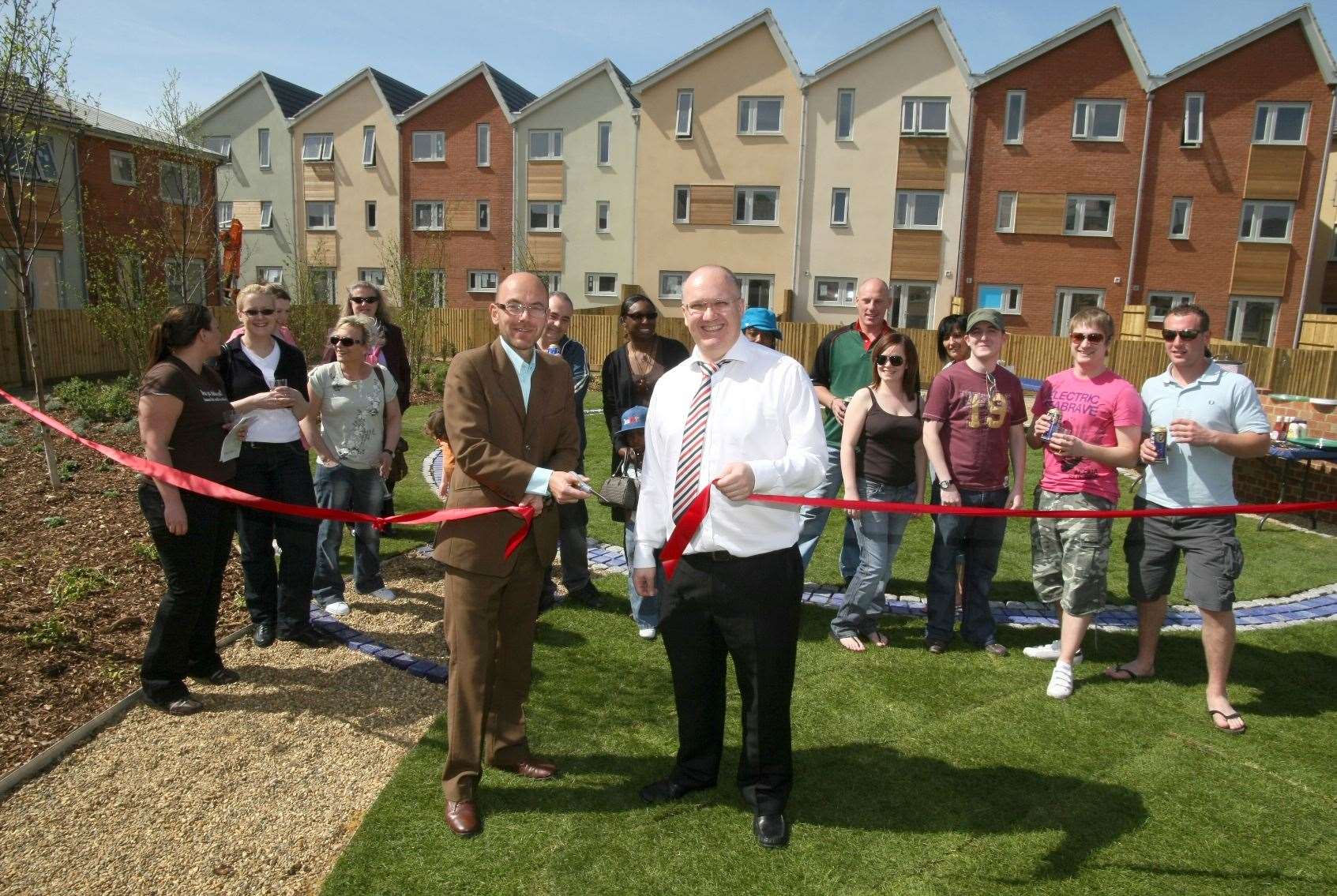 Designer Wayne Hemingway and Jeremy Kite, Dartford Borough Council, cut the ribbon on the first green community spaces to be completed at The Bridge, Dartford, and then celebrated with a barbecue, back in May 2008. Image: Ronan McCloud, BlueIce Communications