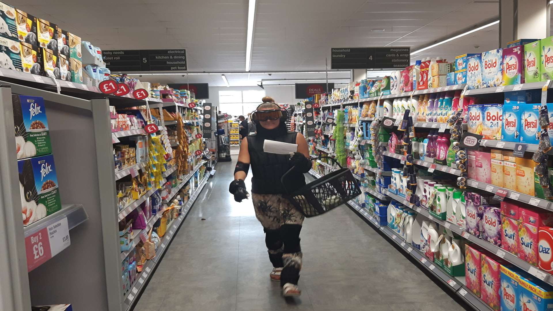 Reporter Eleanor Perkins wears the age simulation suit around The Co-op in Sandwich