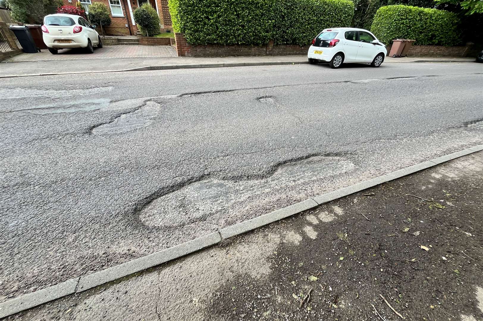 Just some of the potholes in Beacon Oak Road, Tenterden