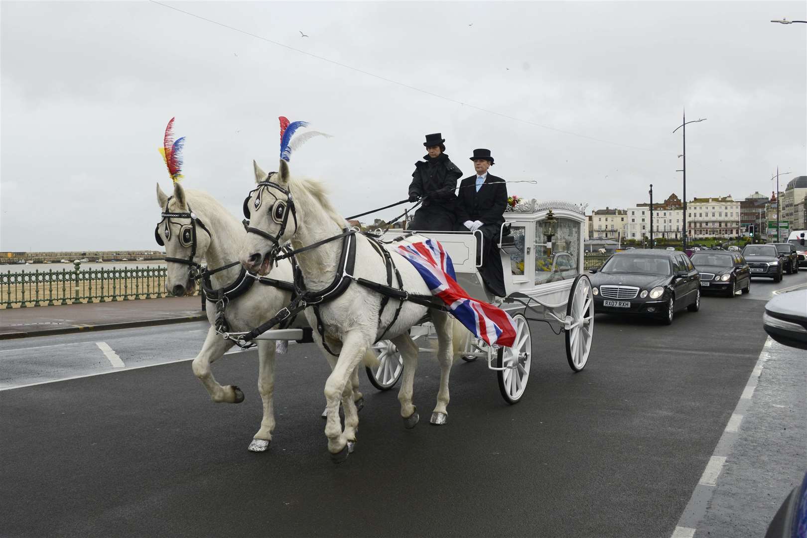 The procession for baby Luchii Gavrilescu makes its way along Margate seafront. Picture: Paul Amos.