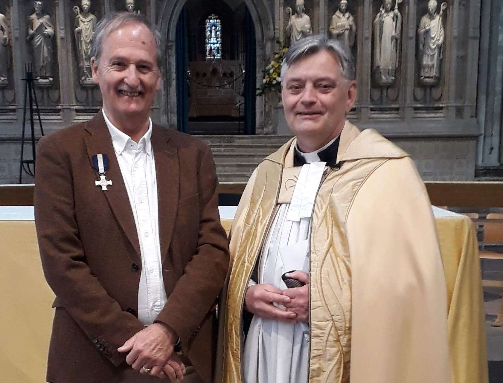 Alan Cook, grandson of Medway Queen commanding officer Capt Alfred Cook, with the Very Rev Dr Philip Hesketh
