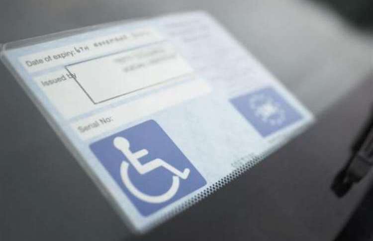 The Blue Badge gives disabled people the privilege of parking in designated bays. Stock picture