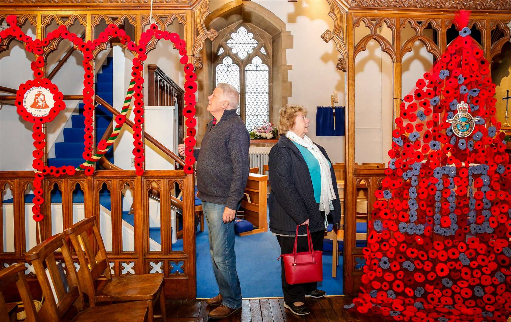 Many towns and villages have unveiled their tributes to the centenary of the ending of the war. At St Mary's Church in Hadlow the displays are admired by Mike Harvey and Pat Large Picture: Matthew Walker