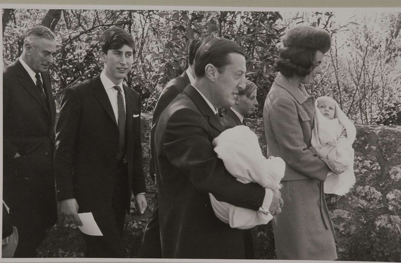 A young Prince Charles with Lord and Lady Brabourne after he stood as godfather to their identical twin sons Nicholas and Timothy. Lord Mountbatten joined them for the service