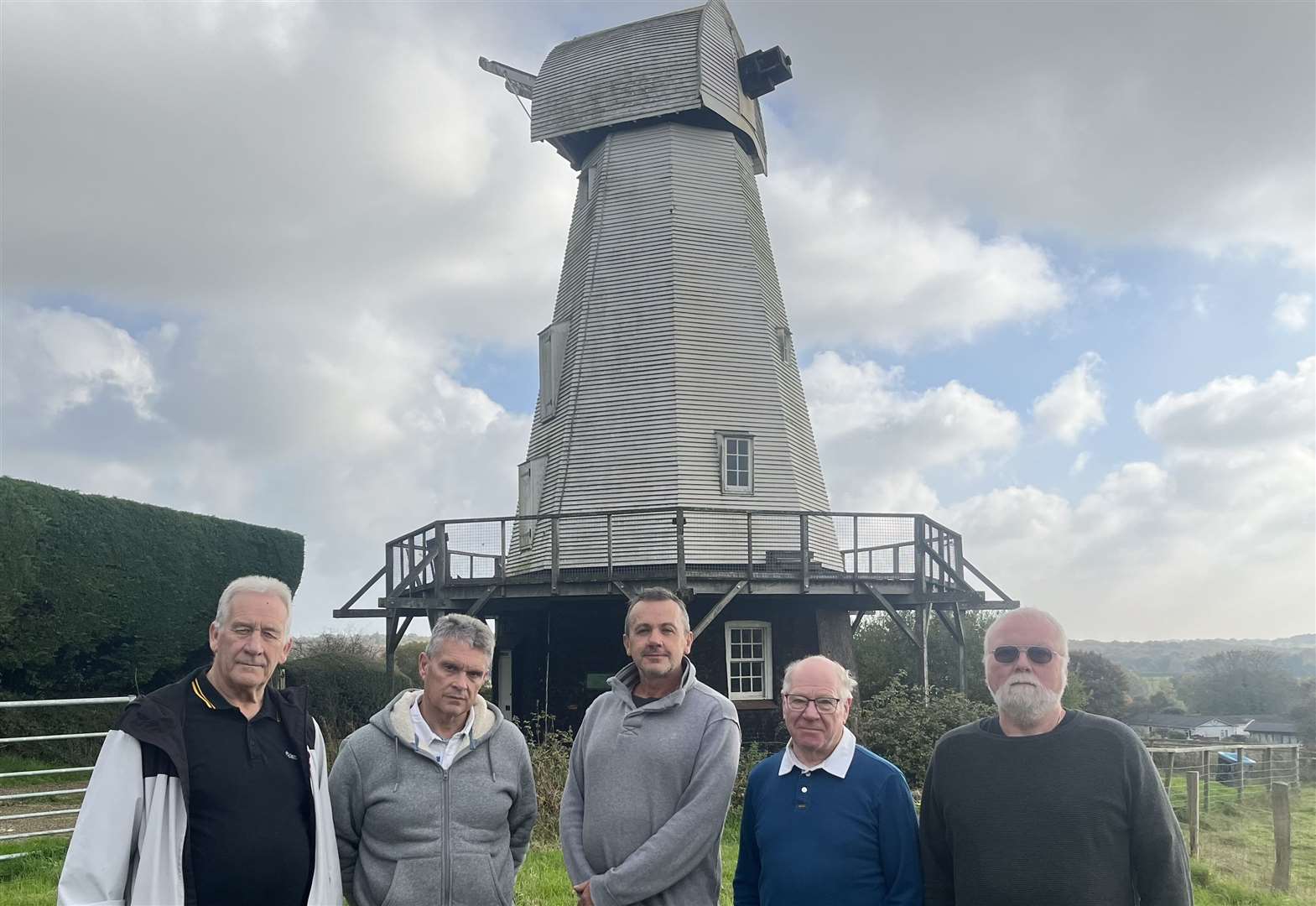 Left to right: Rob Woods of Woodchurch Parish Council; Ian Philo, Woodchurch Parish Council clerk; Gary Hastings of Friends of Woodchurch Windmill; Mel Bailey, Friends of Woodchurch Windmill chairman; and Wade Nash from Woodchurch Heritage Trust