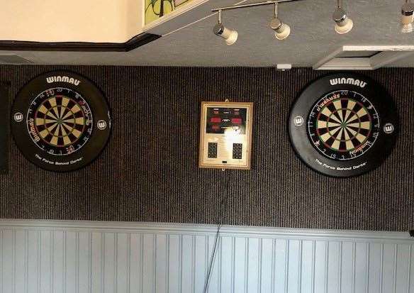 Two for the price of one. In fact, there were double dartboards on this side of the pub and there was another one, again with an electronic scoreboard, on the other side.