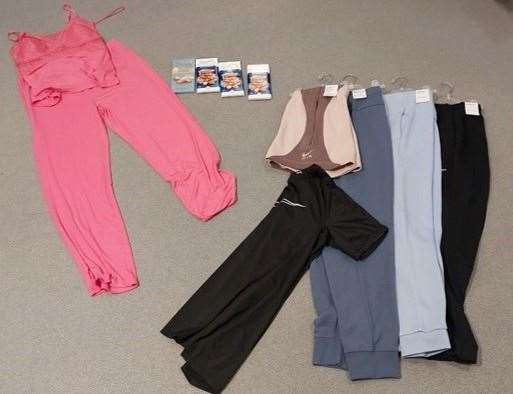 The items including sportswear and chocolate stolen from Ashford Designer Outlet. Picture: Kent Police