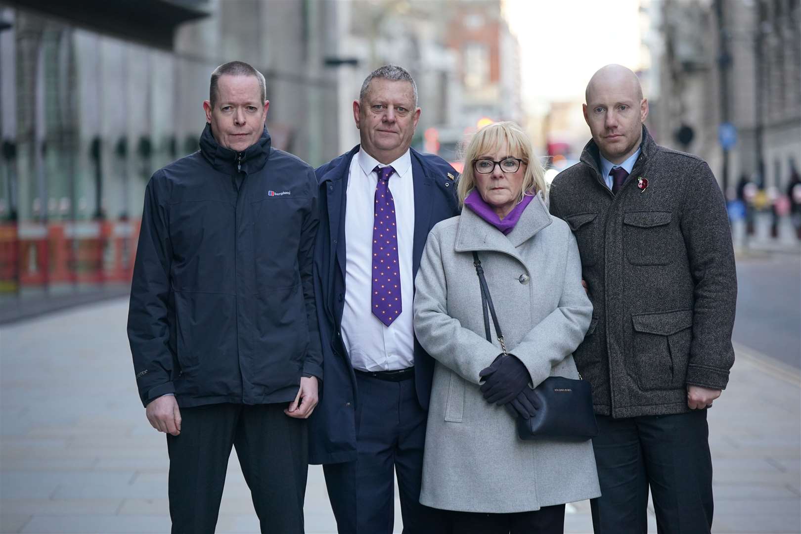 Andrew Wails, Gary Furlong, Jan Furlong and Gary Furlong Jnr outside the Old Bailey for the inquest for victims of the Reading terror attack (Yui Mok/PA)