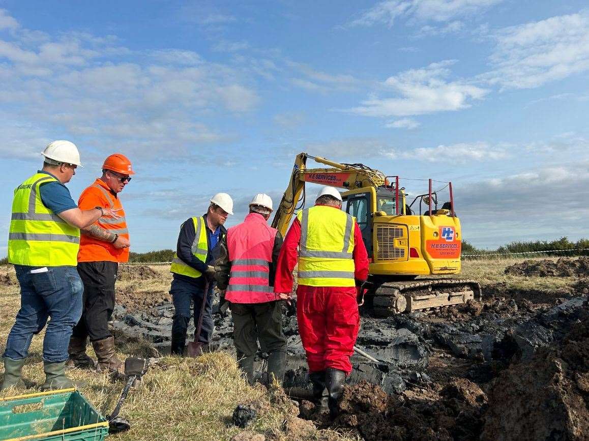 Researchers at the dig site in Hoo where the V2 rocket was found. Picture: H. E. Services