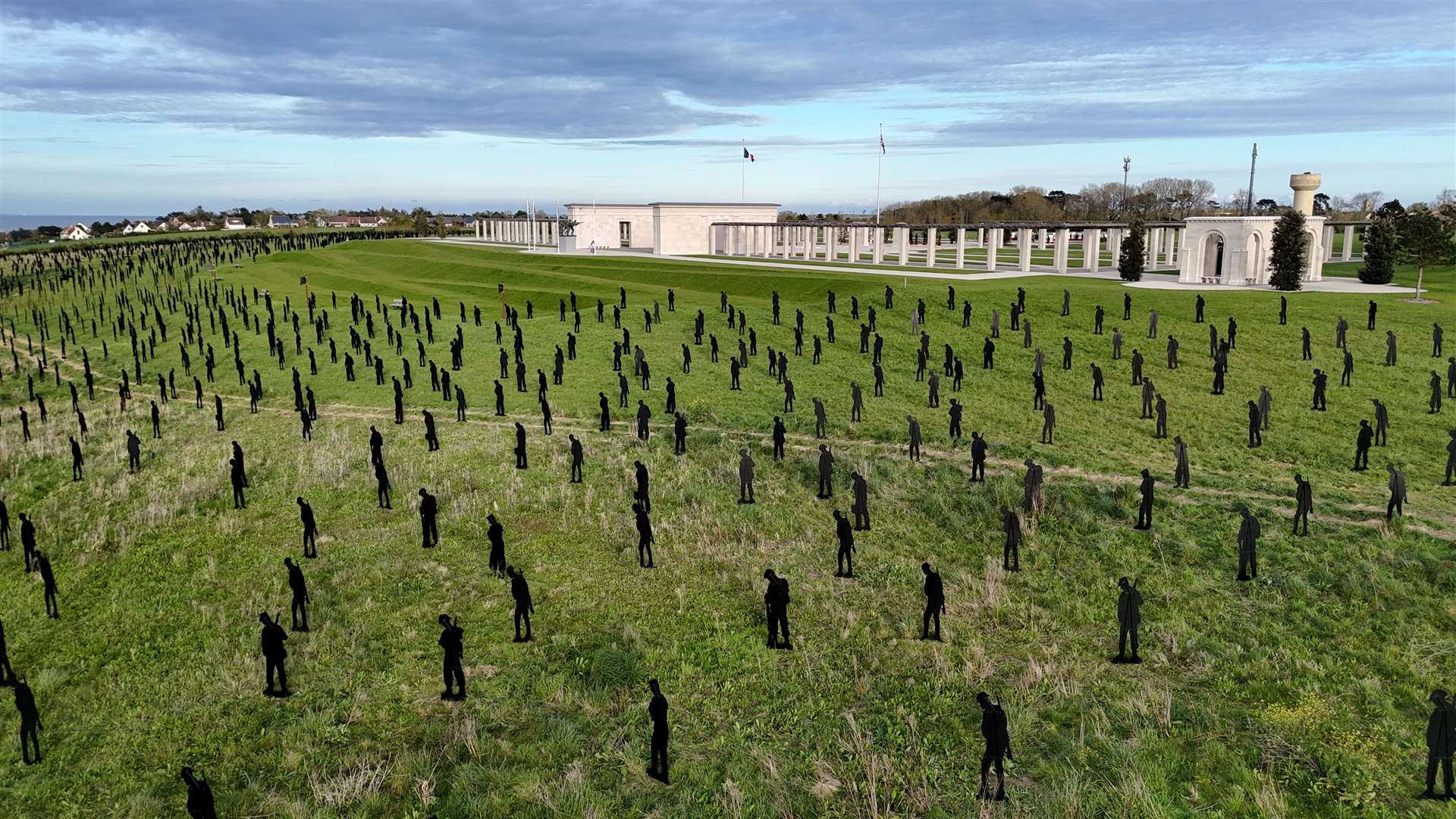 A view of the Standing with Giants silhouettes which create the For Your Tomorrow installation at the British Normandy Memorial, in Ver-Sur-Mer, France, as part of the 80th anniversary of D-Day. The 1,475 statues honour each of the servicemen who fell on D-Day itself and stand in the shadows of the memorial overlooking Gold Beach, where many of them landed almost 80 years ago (Gareth Fuller/PA Wire)