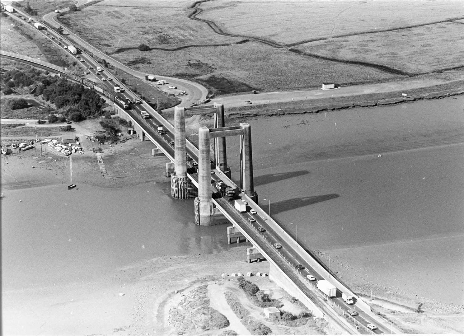 Aerial view of Kingsferry Bridge in 1990. The volume of traffic on the bridge has decreased since the opening of the Sheppey Crossing in 2006.
