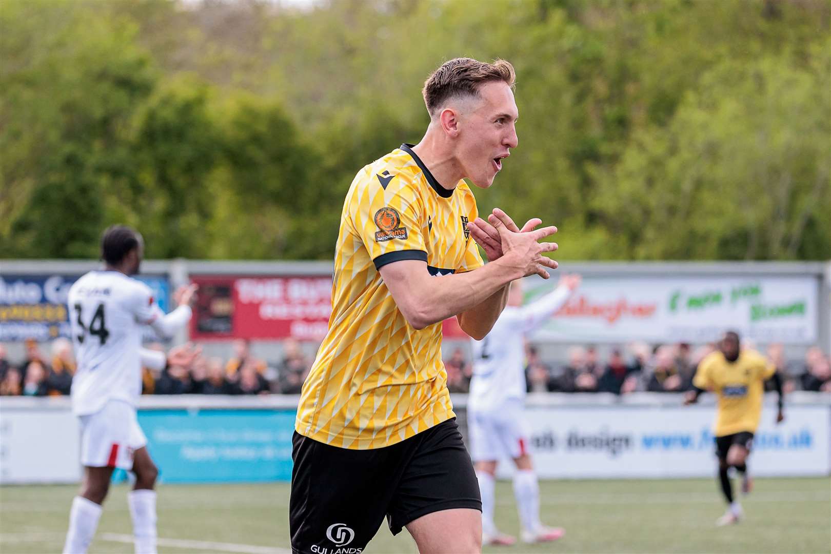 Maidstone striker Matt Rush celebrates his 20th goal of the season - six coming for play-off opponents Aveley. Picture: Helen Cooper