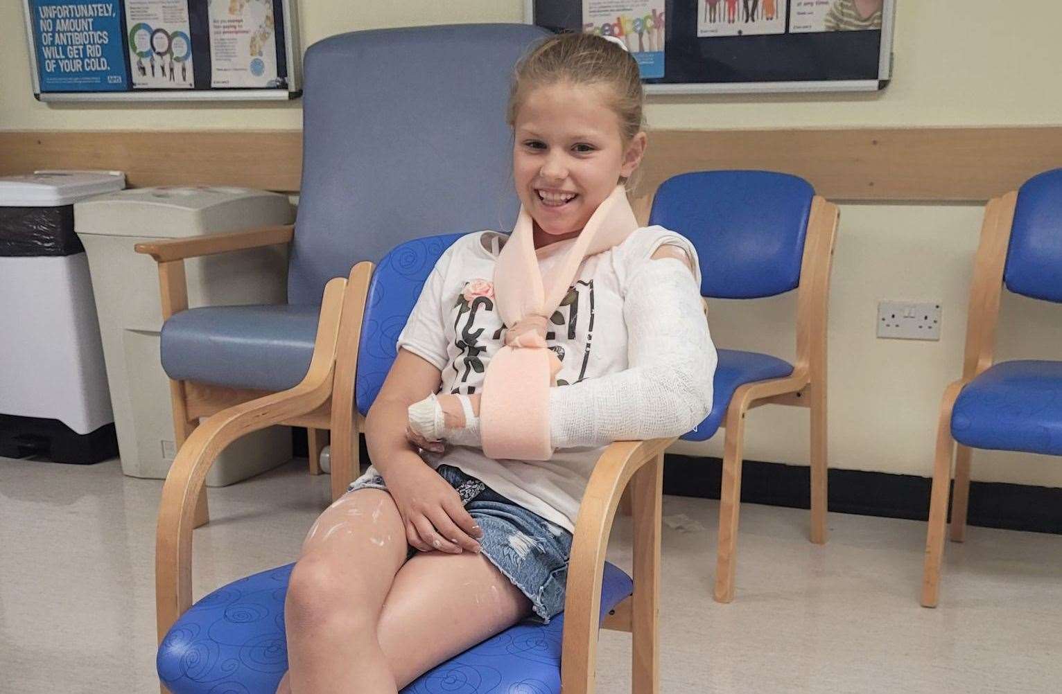 Tamzin Everett, 10, in hospital with her left arm after breaking it on a slide in Beachfields sandpit, Sheerness