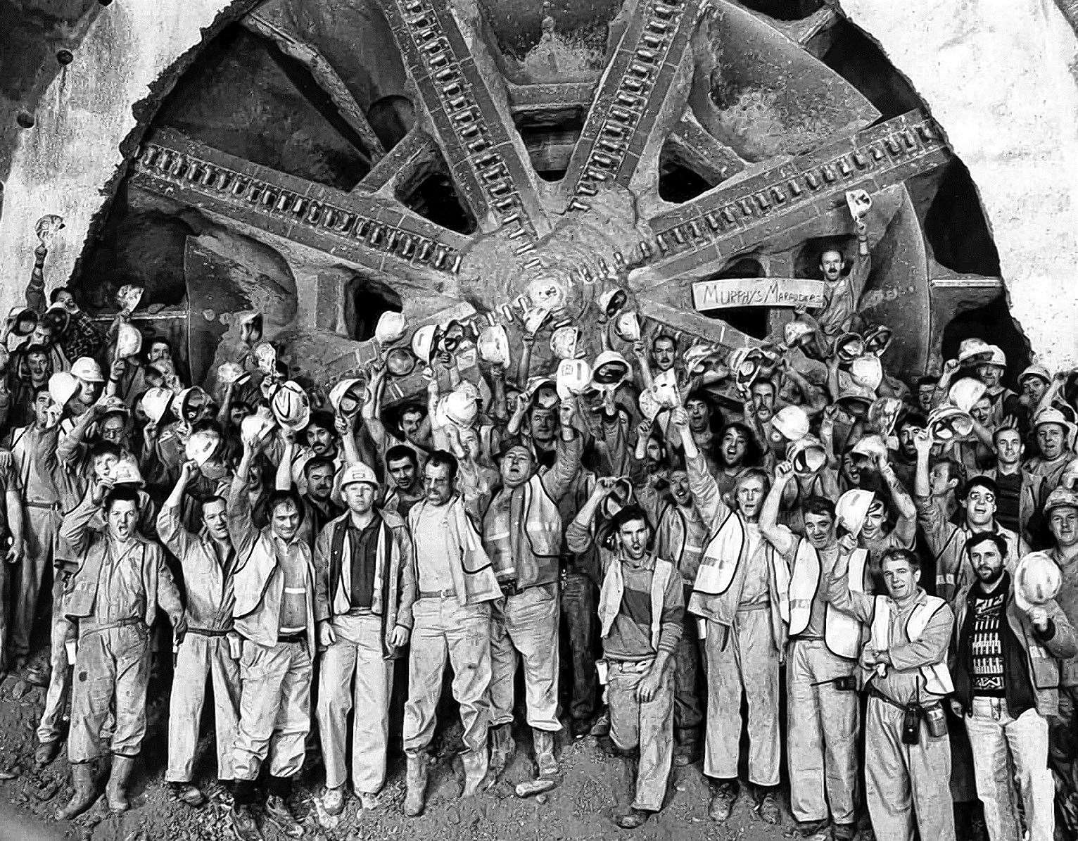 Jubilant tunnel workers after the breakthrough under the Channel in 1990
