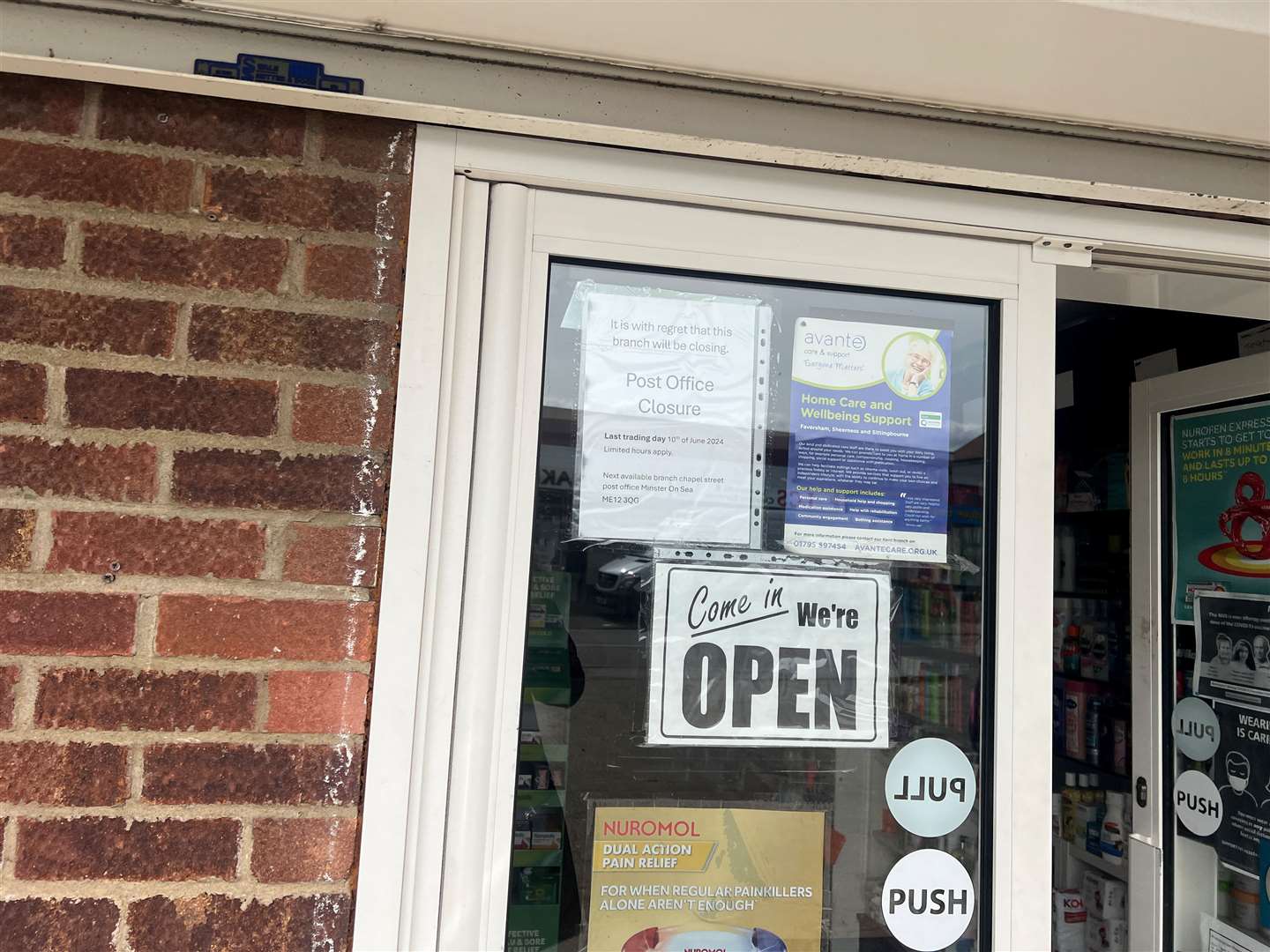 A note on the door of Leysdown pharmacy says that Leysdown Post Office is set to close in two months. Picture: Megan Carr