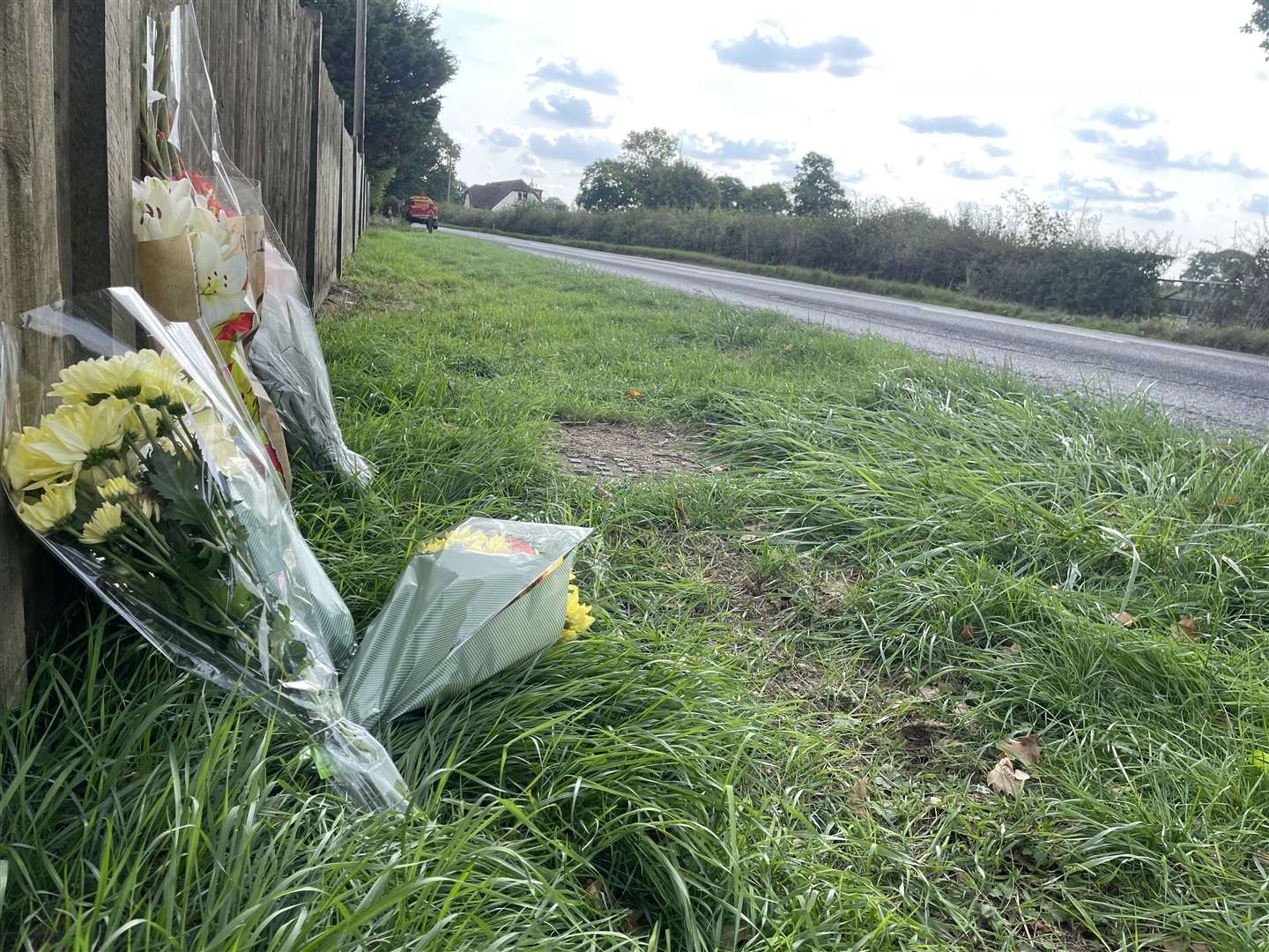 Flowers have been left at the side of the road where Chris Smith was killed