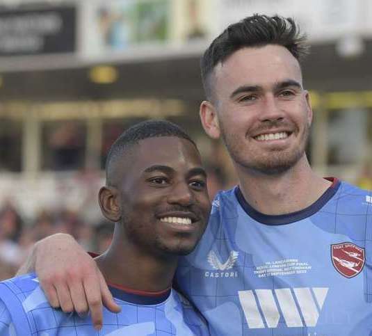 Kent team-mates Nathan Gilchrist and Tawanda Muyeye after the Spitfires win the 2022 One-Day Cup. Picture: Barry Goodwin