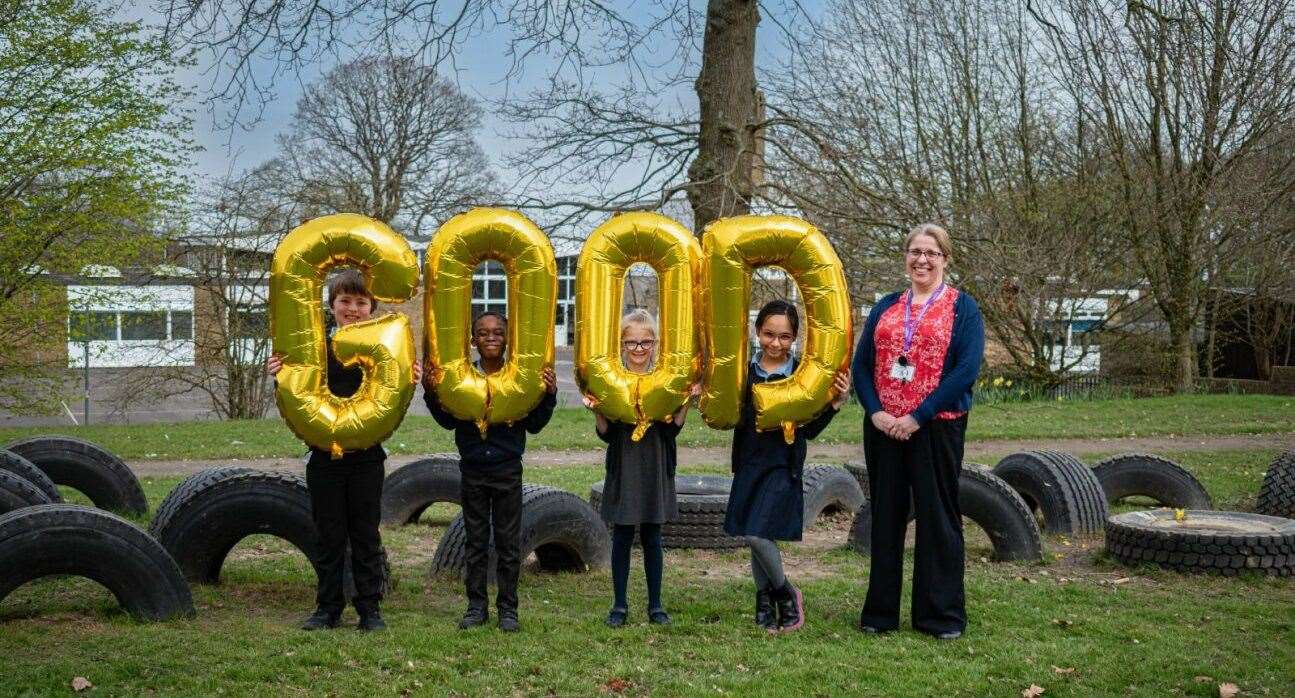 Principal Jane Wright with pupils celebrating the and pupils celebrate "good” Ofsted report
