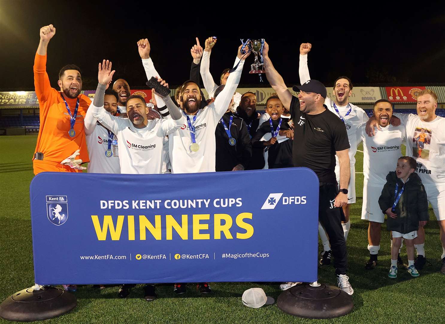 The Charcoal celebrate DFDS Kent Veterans Cup glory. Picture PSP Images