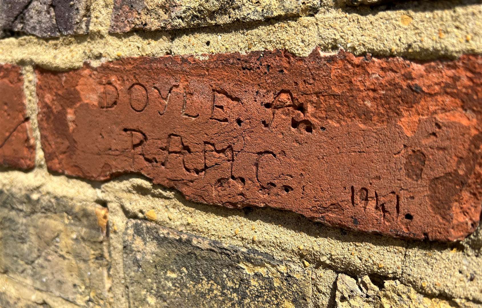 Engravings made by servicemen treated at the hospital can still be seen on the wall
