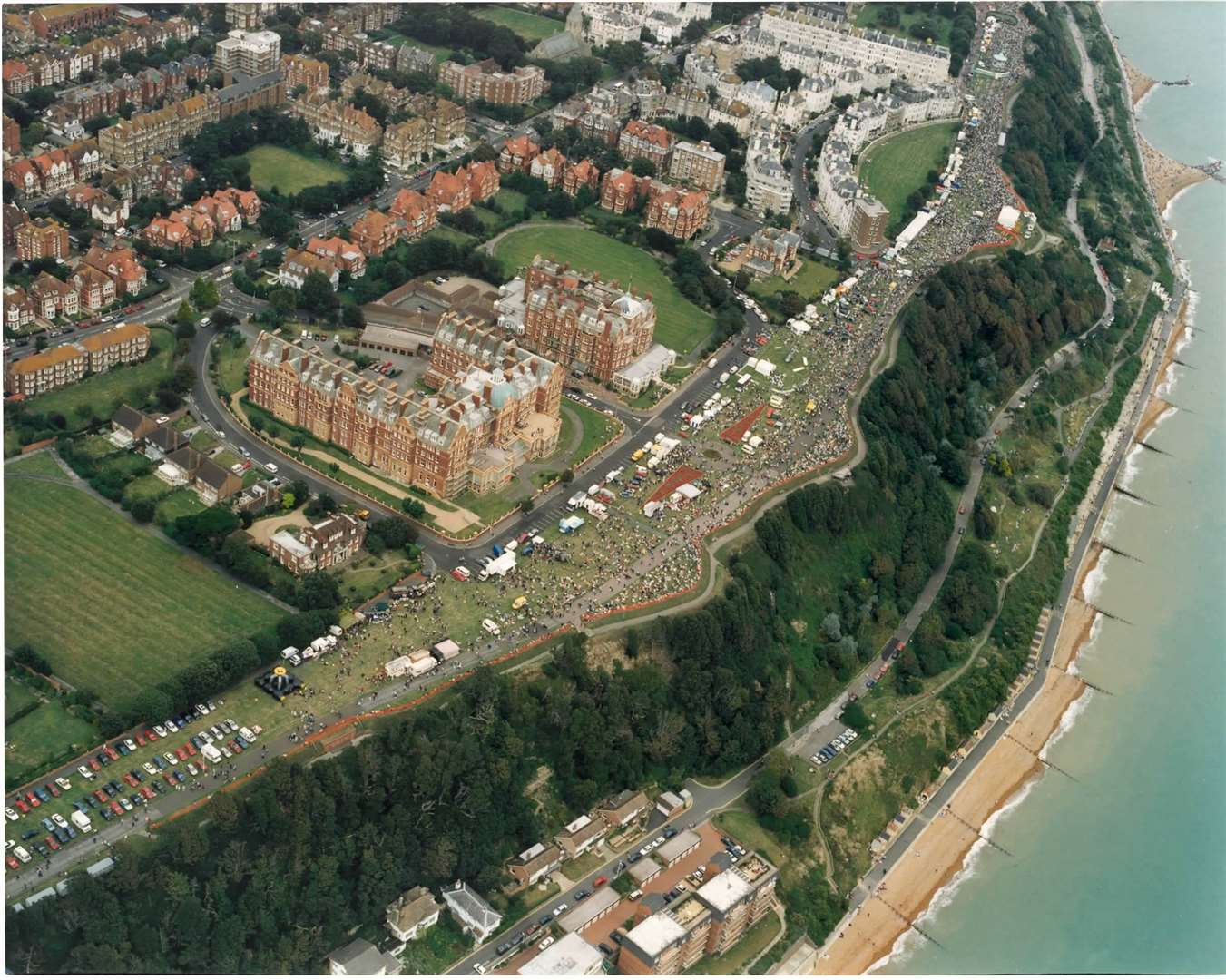 The Leas, and Folkestone seafront down below, packed with spectators for the 1997 Shepway Festival Airshow. Pic: Fotoflite