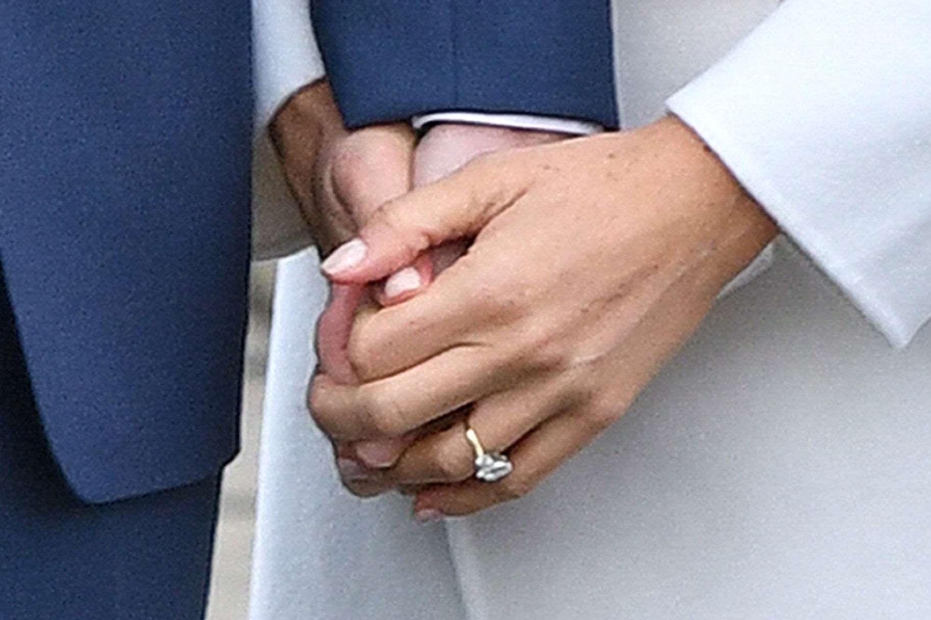 Meghan shows off her engagement ring