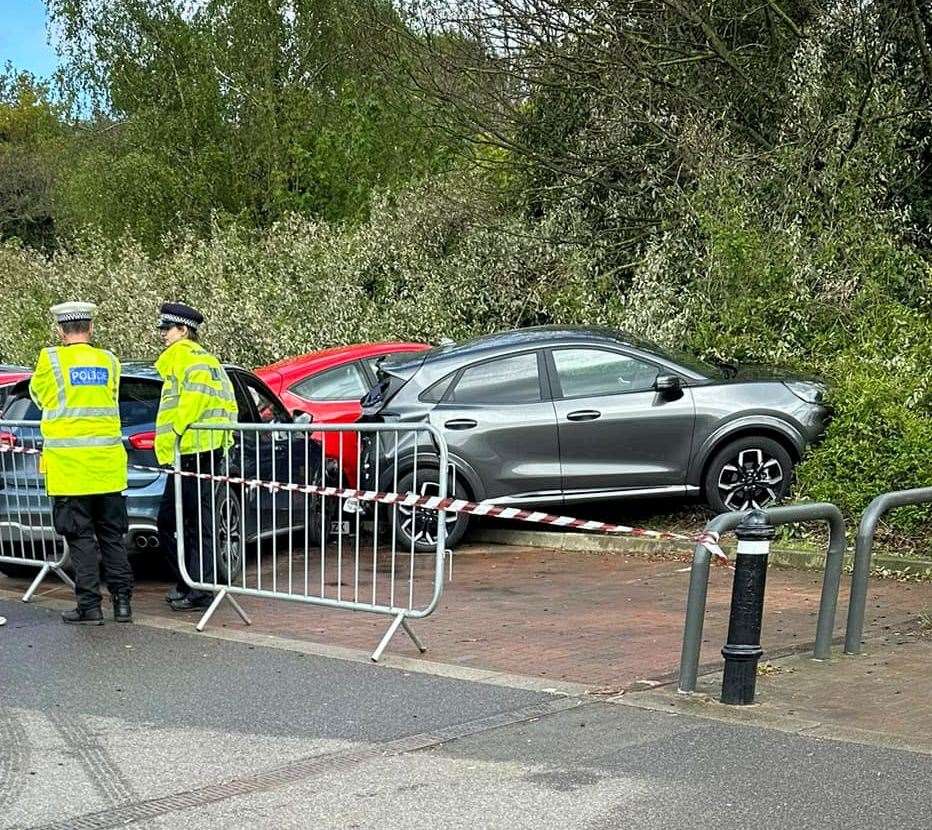 A car crashed into several parked vehicles in Sainsbury's, Aylesford. Picture: Áron Szák