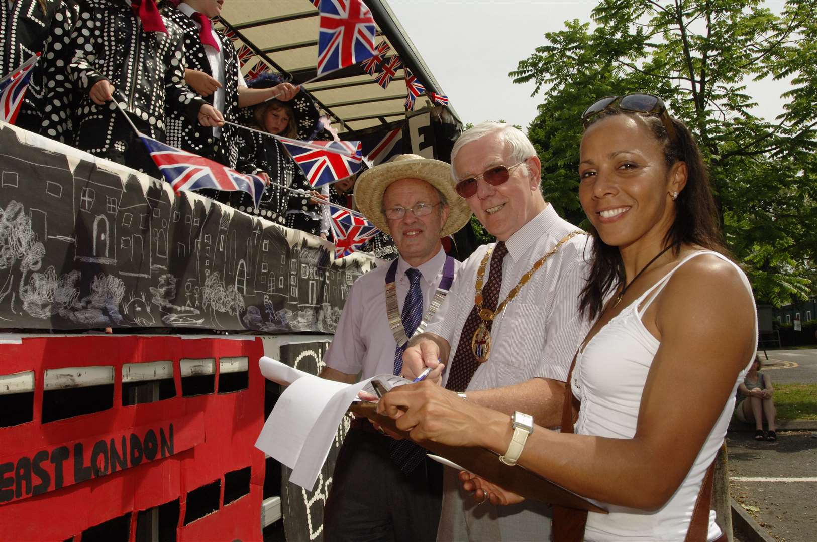 Dame Kelly Holmes (right) helps Graham Rapley from the Lions and Mayor Russell Dorling to judge the carnival floats at Tonbridge Carnival in 2006 Picture: Andy Payton