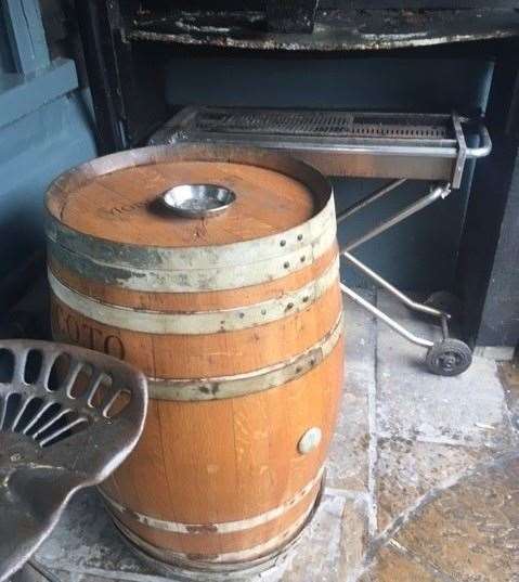 You’ll find tractor seat stools and tables made from barrels in the outside area