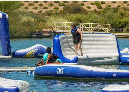 St Andrews Lakes is known for its obstacle course as well as water-related activities. Picture: Stock Pic/ Aquaglide Aquaparks