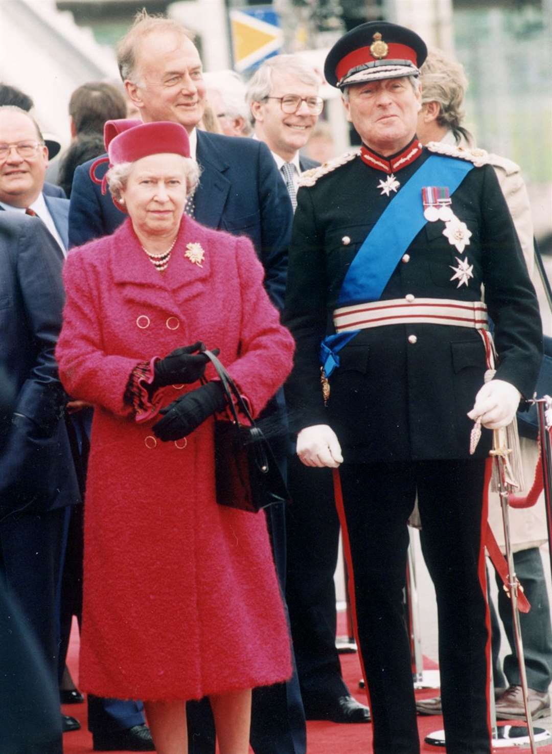 The Queen and then Lord Lieutenant of Kent, Robin Leigh-Pemberton, a the official opening of the Channel Tunnel in May 1994 - then-PM John Major can be seen in the background