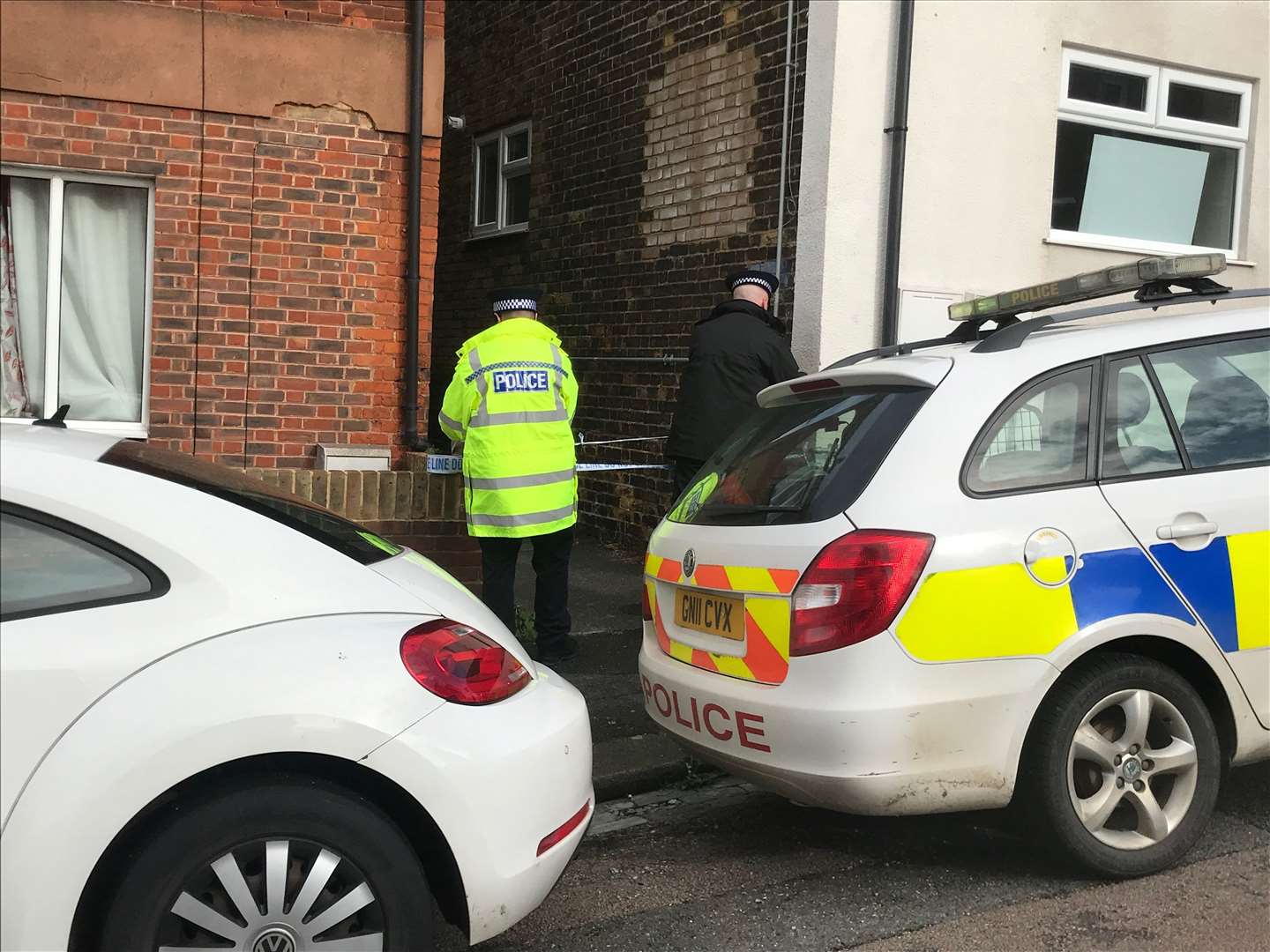 Police in Ross Street, Rochester, this morning after a man's body was discovered on Sunday